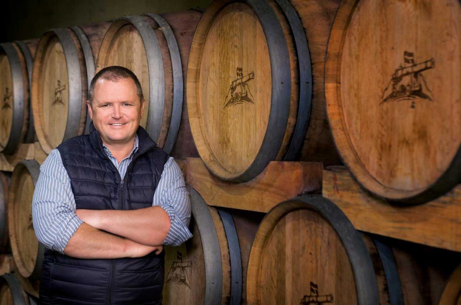 Abrie Beeslar in a barrel cellar